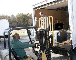 Photo of truck with used electronic equipment for recycling